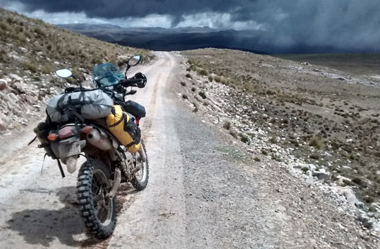 Mark's bike overlooking a rocky valley.