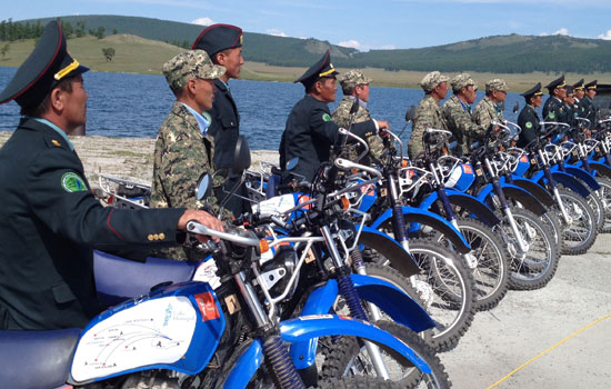 Mongolian park rangers and their bikes