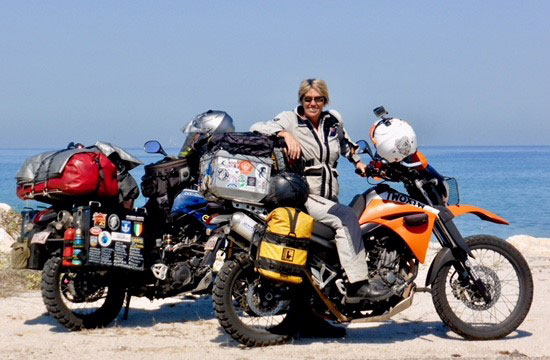 Lyn and two bikes with oceanview