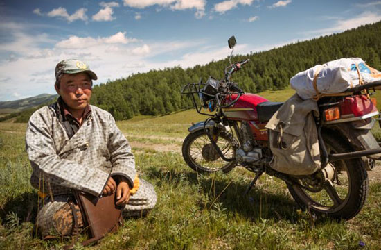 Mongolian park ranger and bike