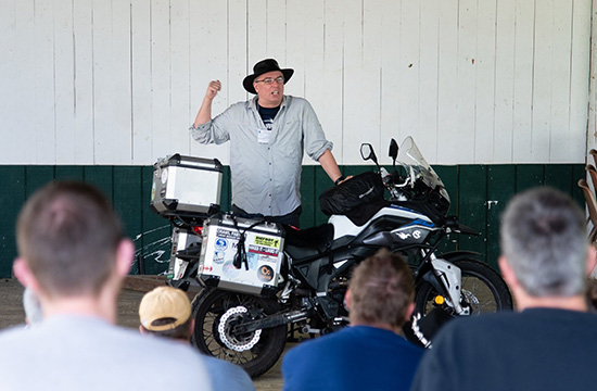 Andrew Pain teaching workshop about how to pack a bike.