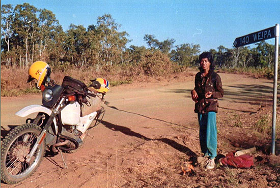 Emy Woodburn, Weipa road sign and motorcycle
