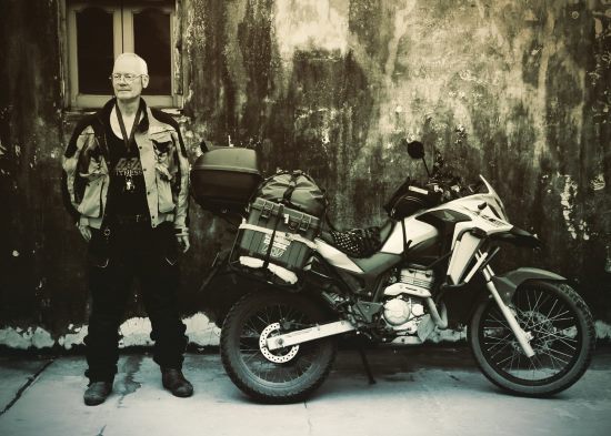 Peter Bodtke with motorcycle, Honda XRE.