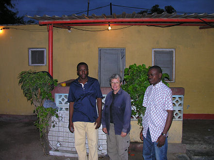 Luis and his friend Daddy outside Luis's unit in Soyo where we stayed the night