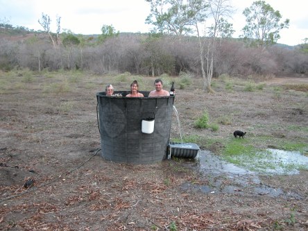 Afternoon dip in the big bucket an old septic tank