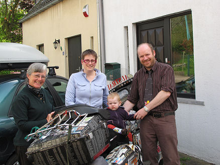 Ewan and family outside their home