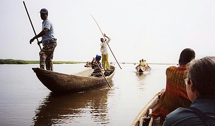 Heading for a town in the lake, on Lake Ganvie, people live on stilt houses