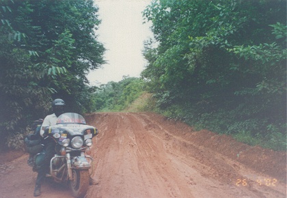 The road muddy but good traction, a lot of sand mixed in the clay