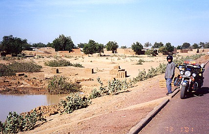 Making mud bricks at a drying up waterhole