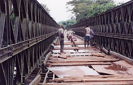 Moving steel and wood to make crossing this bridge possible