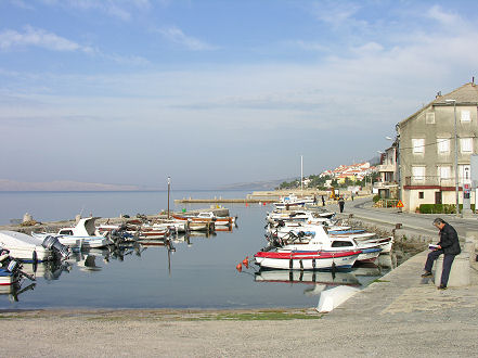 Lonely Planet research, soaking up sun in the fishing village of Karlobag 