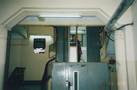 Hotel elevator with only half a door that worked