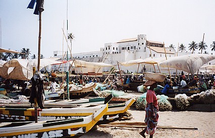 Selling fish directly off the boats under their sails in front of the old fort