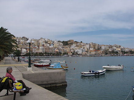 Picnic lunch at the Port of Sitia with a Lidl bag. Our favourite supermarket in Europe