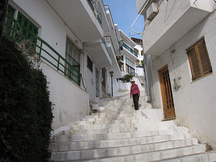 White steps and buildings of the beach town of Agia Galini