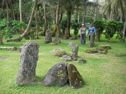 Joe and Kay looking at latte stones on Joe's property