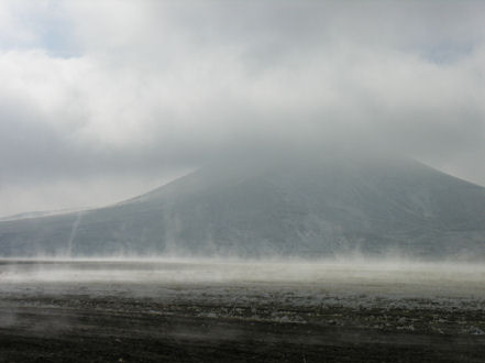 Whirlwinds and fingers of rising mist off the frozen ground