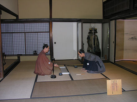 Manniken Samurai playing their part in the original Samurai house in Matsue