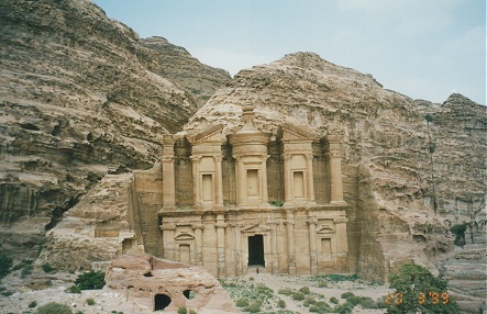 Kay standing in the doorway, carved out of the mountainside