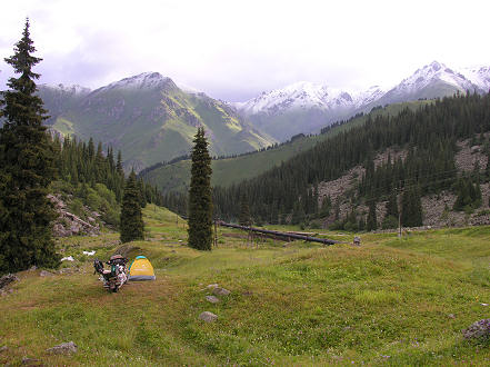 An overnight dusting of new snow on the mountain peaks