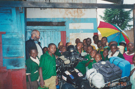 Sheltering from the rain with a group of school children