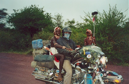 Young Samburu warriers, a ride in exchange for a photo