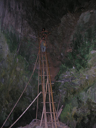 Climbing down into the cave hospital used during the Vietnam war