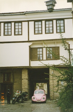 Narrow street under houses