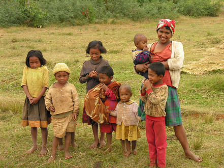 A family gathered as we stopped to photograph their house