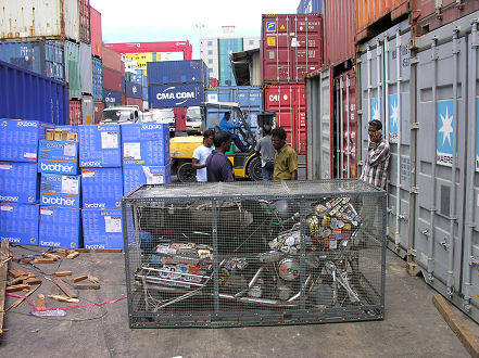 Unloading the container at the crowded wharf