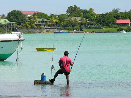 A local relaxing at Grand Baie