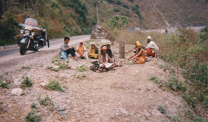 Sadhus brewing their variety of tea roadside