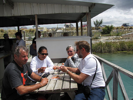 Enjoying salmon sashimi at the salmon farm