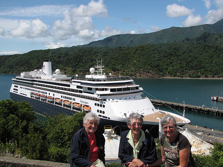 Kay, her Mum and Shirley in front of their cruise ship