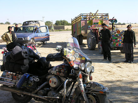 Police escort waiting for us to have a tea break near Sukkur