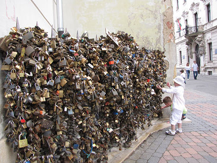 Padlocking love to a wall in Pecs