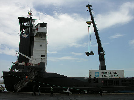 Loading the motorcycle with the large container crane