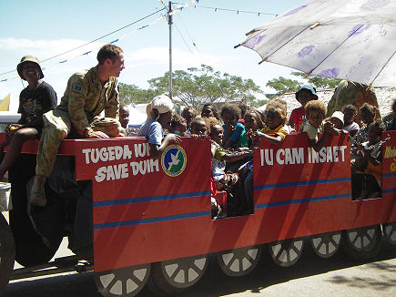 RAMSI working on public relations with a childrens ride