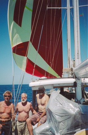 Flying the gennaker, Captain, Bob (a new passenger) and Peter