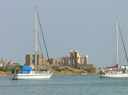 Yachts from Europe with the old Suakin City in the background