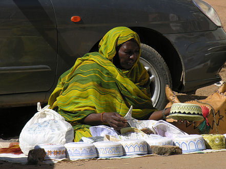 Selling traditional hats in the streets of Omdurman