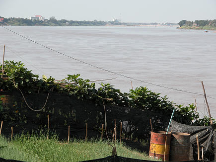Both sides of the Mekong with the friendship bridge crossing