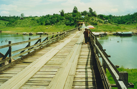 Long ricketty wooden bridge