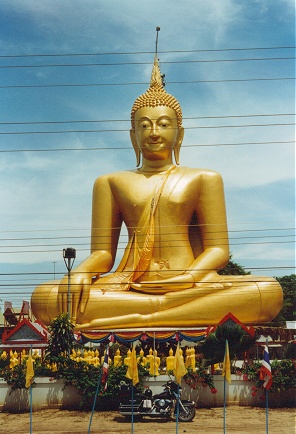 Enormous Buddah, compared to the motorcycle.