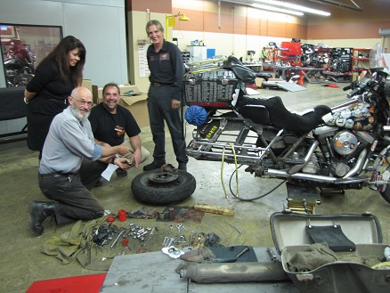 Changing
          the rear tyre at Santa Fe H-D