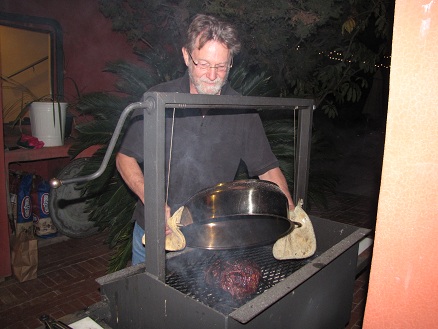 Philip woodfire
          cooking the dinner leg of lamb