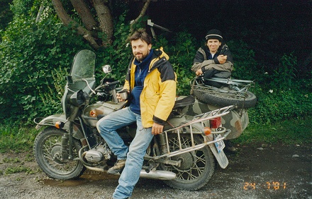 French couple riding a Russian Ural around the world