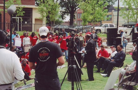 Jessie Jackson, at the site of Martin Luther King's assassination, a union rally for better working conditions