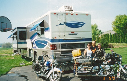Jimbo and Donna, and their typical American motorhome with slide out
