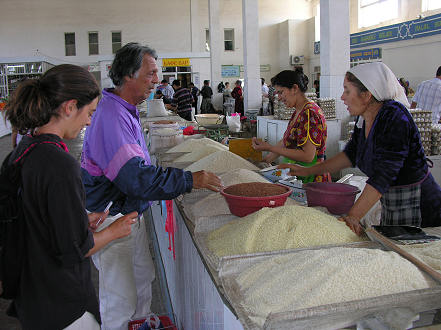 Buying goods in the market with Mubinjon for our "plov" dinner